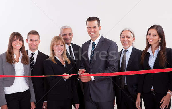 Management about to cut the red ribbon Stock photo © AndreyPopov
