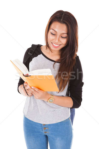 Female Student Reading Book Stock photo © AndreyPopov