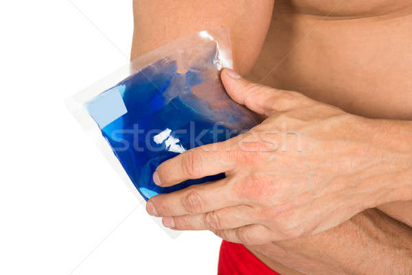 Hand With Ice Gel Pack On Elbow Stock photo © AndreyPopov