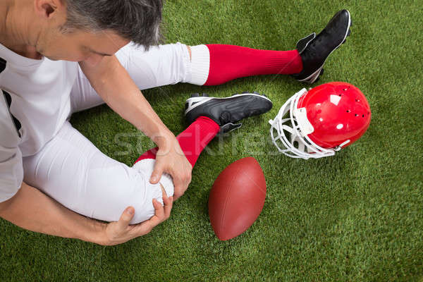 Stock fotó: Amerikai · futballista · sérülés · láb · közelkép · mező