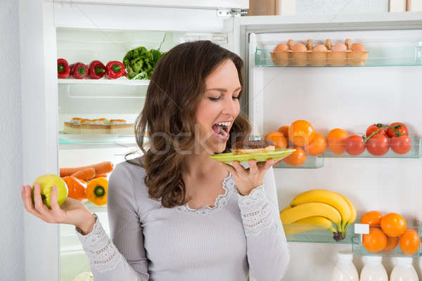 Frau Apfel Essen Donut grünen Stock foto © AndreyPopov