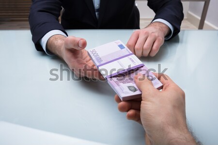 Woman Using Glucometer To Check Blood Sugar Level Stock photo © AndreyPopov