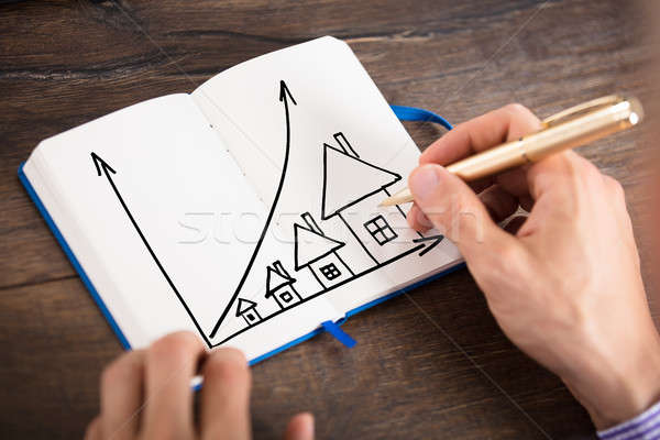 Foto stock: Empresario · dibujo · casas · tabla · diario · vista