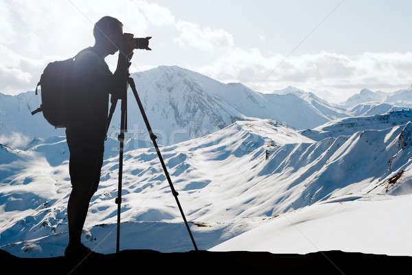 Silhouette Of A Man Photographing In Winter Stock photo © AndreyPopov