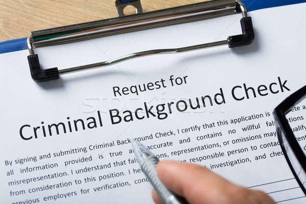 Hand Filling Criminal Background Check Application Form Stock photo © AndreyPopov
