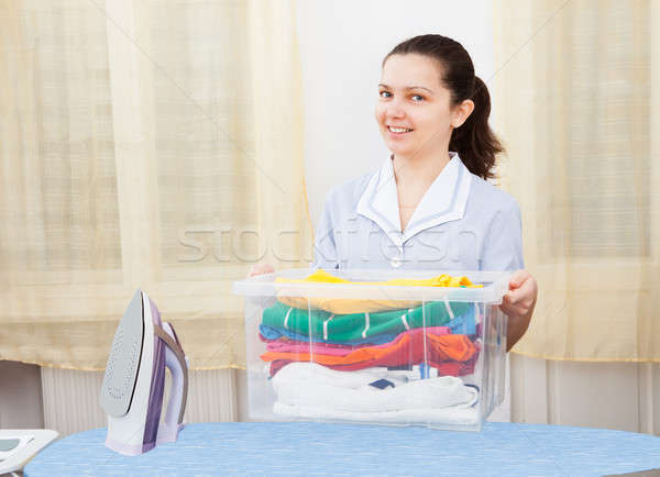 Woman Holding Laundry Basket Stock photo © AndreyPopov