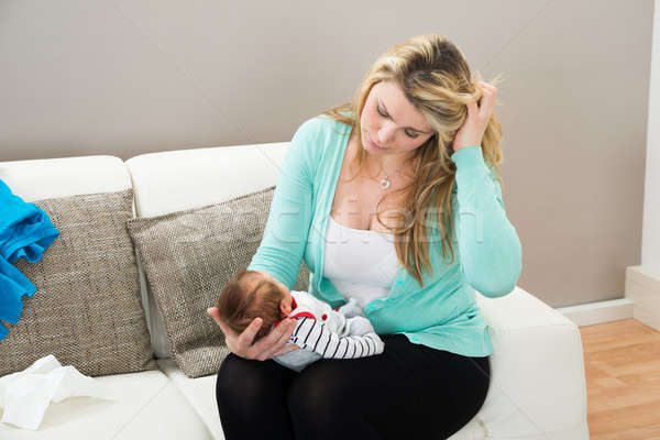 Stock photo: Mother With The Baby