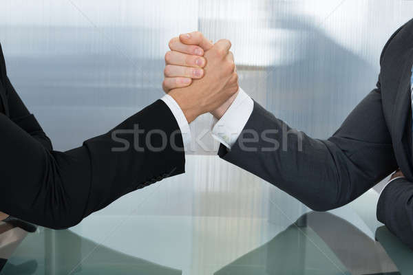 Dwa biznesmen wrestling inny ręce Zdjęcia stock © AndreyPopov
