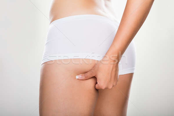 Nő kövér fenék közelkép háttér szépség Stock fotó © AndreyPopov