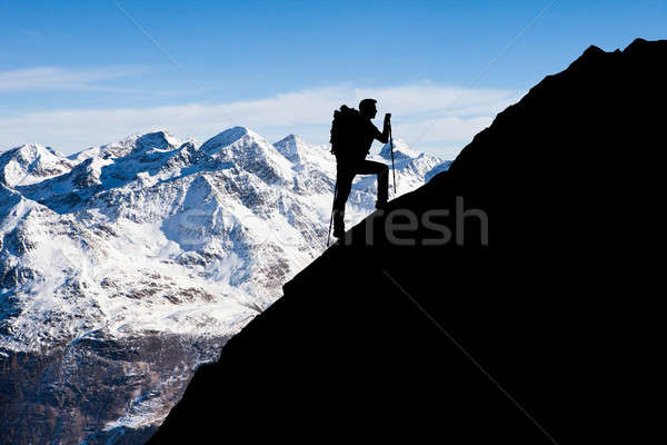 Man Hiking On Rocky Mountain Stock photo © AndreyPopov