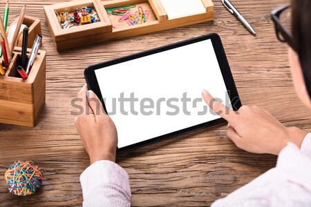 Stock photo: Businesswoman Looking At Digital Tablet