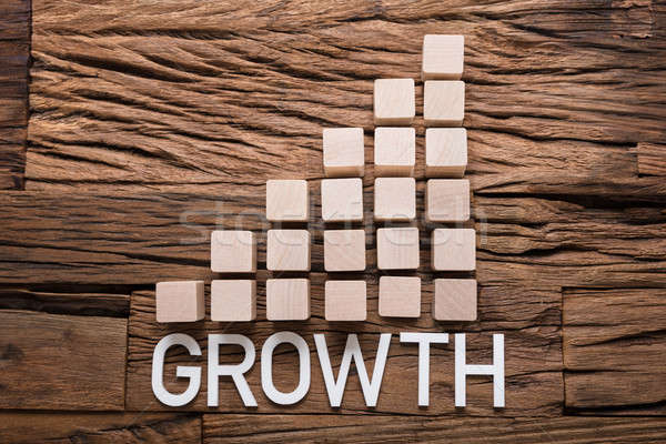Growth Text By Increasing Bar Graph Blocks On Wood Stock photo © AndreyPopov