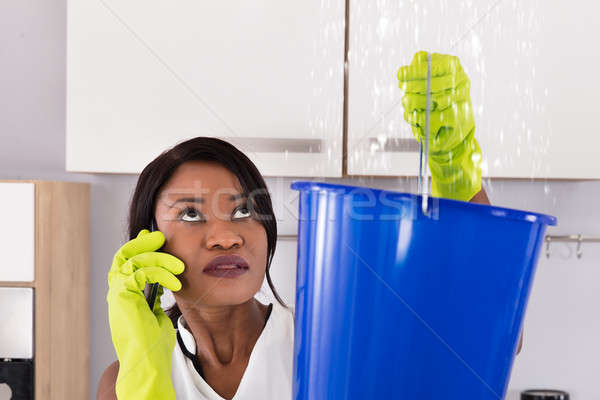 Woman Calling Plumber Stock photo © AndreyPopov