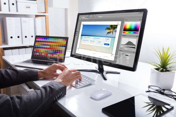 Designer Editing Photo On Computer Stock photo © AndreyPopov