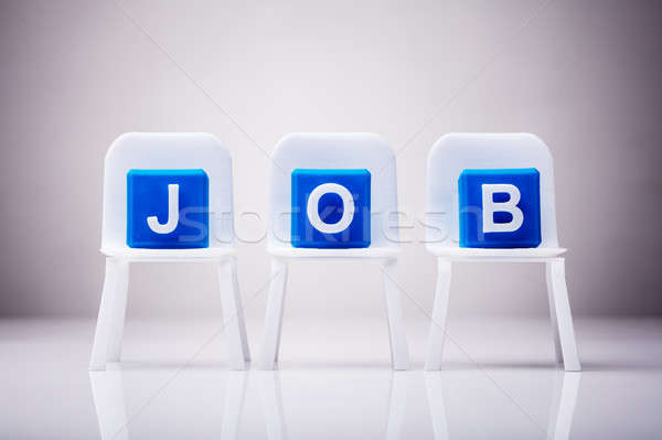 Blue Cubic Blocks With Job Word On Chairs Stock photo © AndreyPopov