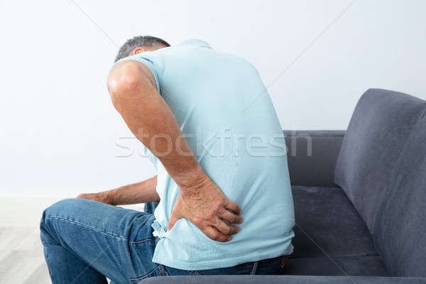 Mature Man Suffering From Back Pain Stock photo © AndreyPopov