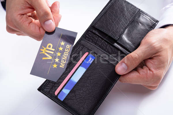 Businessman Removing VIP Card From Wallet Stock photo © AndreyPopov
