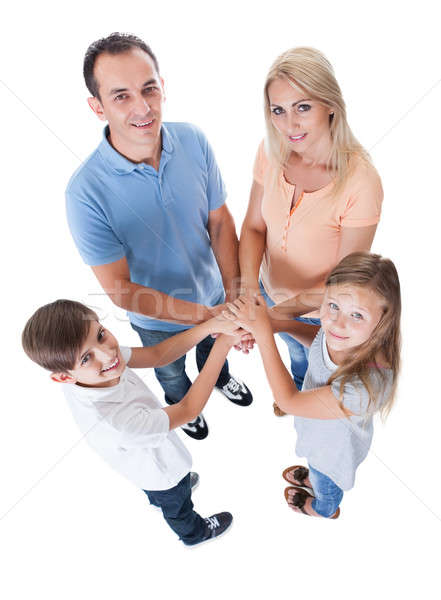 Elevated View Of Family Putting Hands Together Stock photo © AndreyPopov