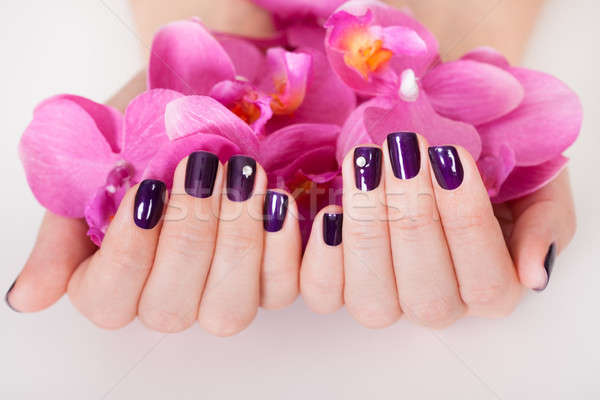 Woman with beautifully manicured nails Stock photo © AndreyPopov