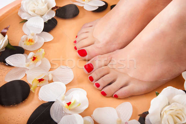 Female Feet Getting Aroma Therapy Stock photo © AndreyPopov