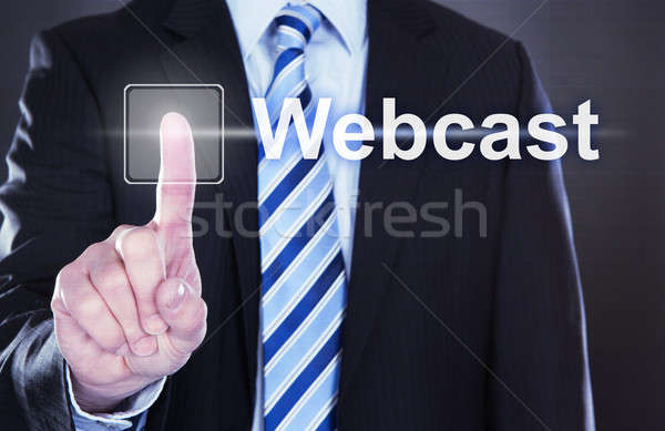 Businessman Pressing Webcast Button Stock photo © AndreyPopov