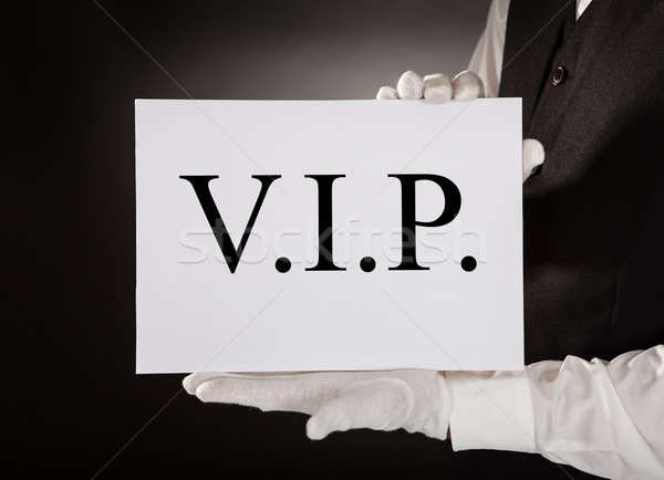 Waiter Holding Board With The Text Vip Stock photo © AndreyPopov