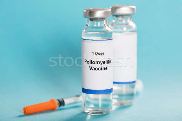 Vacuna botellas jeringa turquesa vidrio salud Foto stock © AndreyPopov