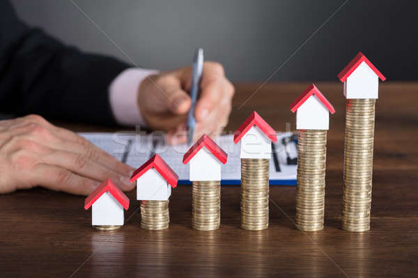 Close-up Of A Businessman Calculating Tax Stock photo © AndreyPopov