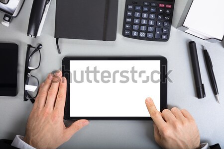 Businessperson Holding Digital Tablet Stock photo © AndreyPopov