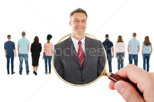 [[stock_photo]]: Main · loupe · candidat