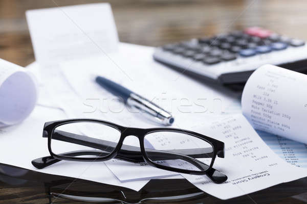 Eyeglasses And Pen On Receipt Stock photo © AndreyPopov