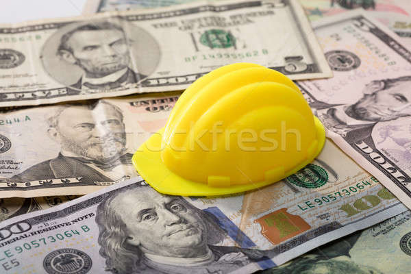 Hart Hat On Dollar Banknotes Stock photo © AndreyPopov