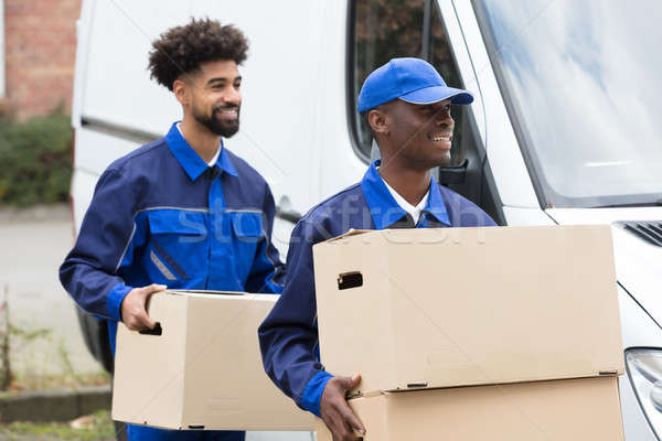 Two Men Holding The Cardboard Boxes Stock photo © AndreyPopov