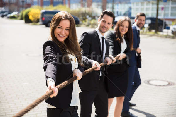 Businesspeople Playing Tug Of War Stock photo © AndreyPopov