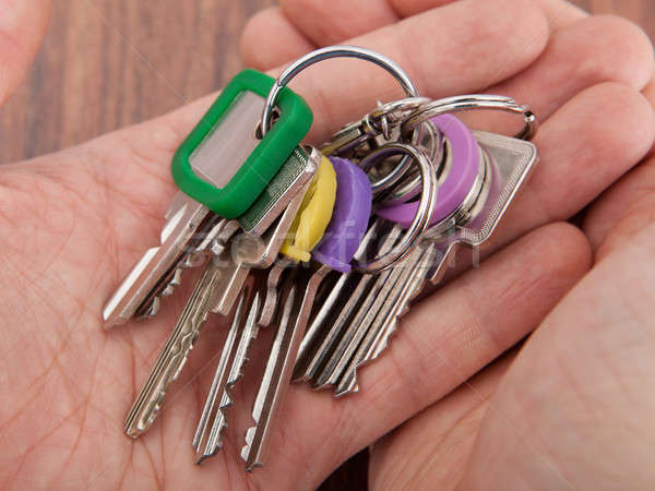 Kéz hordoz köteg kulcsok közelkép otthon Stock fotó © AndreyPopov