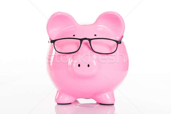 Smart piggybank on white Stock photo © AndreyPopov