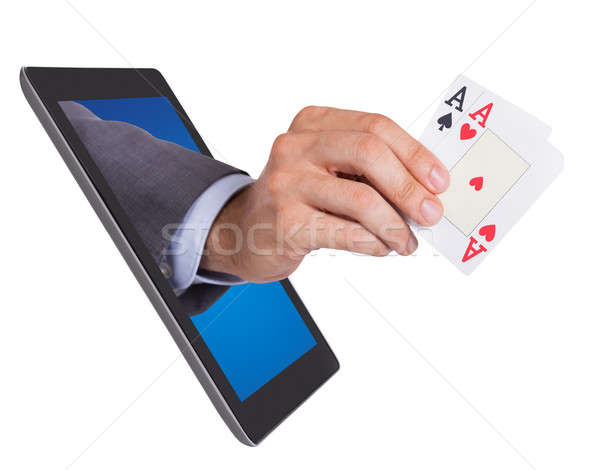 Hand halten ace Karten Tablet digitalen Stock foto © AndreyPopov