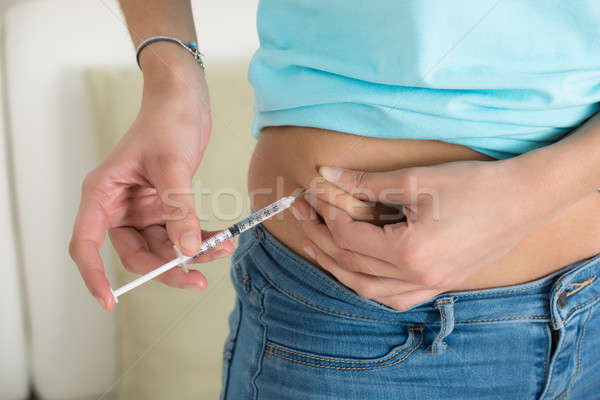 Imagine de stoc: Diabetic · femeie · stomac · acasă · casă