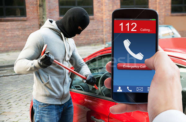 Pessoas mão emergência chamar telefone móvel ladrão Foto stock © AndreyPopov