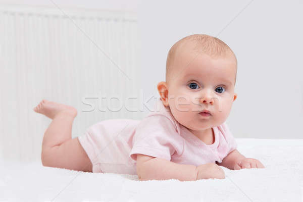 Baby Lying On Bed Stock photo © AndreyPopov