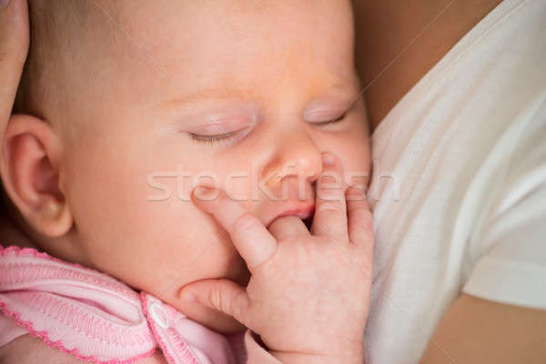 Baby Sleeping On Mom's Arm Stock photo © AndreyPopov