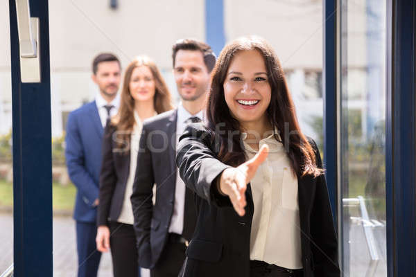 Close-up Of A Smiling Young Businesswoman Stock photo © AndreyPopov