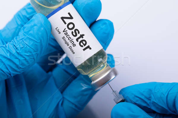 醫生 填充 疫苗 注射器 醫生 手 商業照片 © AndreyPopov