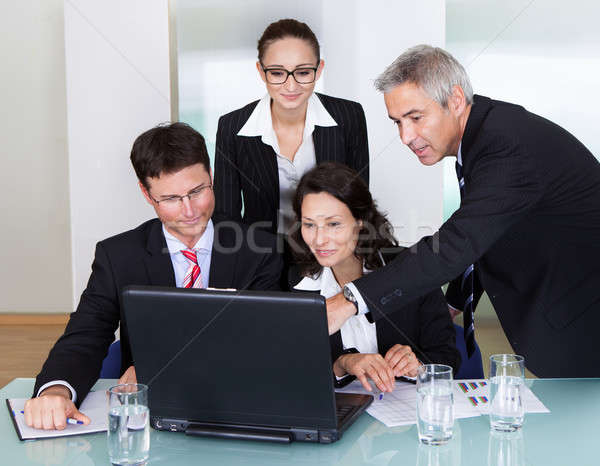 Businesspeople having a discussion Stock photo © AndreyPopov