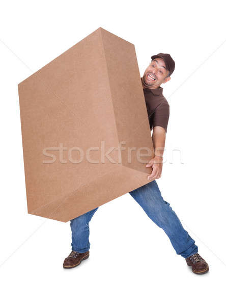 Futár hordoz nehéz doboz fehér boldog Stock fotó © AndreyPopov