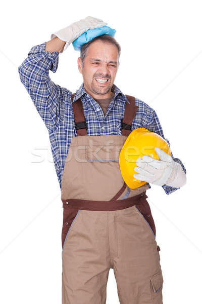 Construction Worker Suffering With Headache Stock photo © AndreyPopov