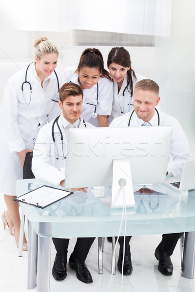 врачи Desktop ПК команда вместе столе Сток-фото © AndreyPopov