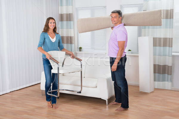 Arrangement Of Chair And Carpet In New Apartment Stock photo © AndreyPopov