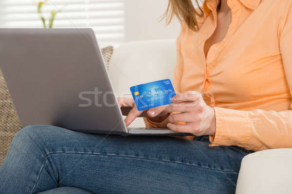 Close-up Of A Woman Shopping On Laptop Stock photo © AndreyPopov