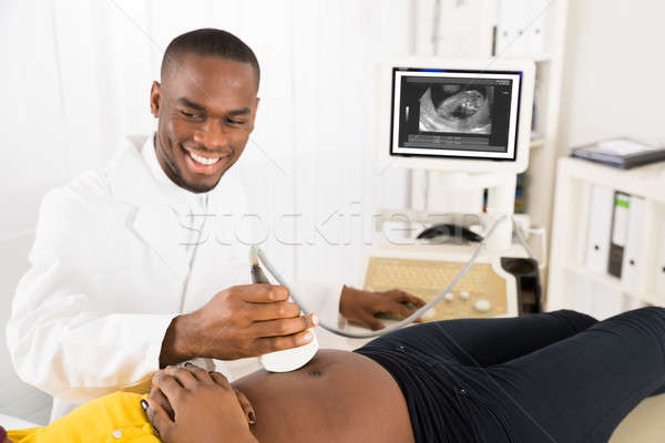 Ginekolog ciąży ultradźwięk brzuch kobieta lekarza Zdjęcia stock © AndreyPopov
